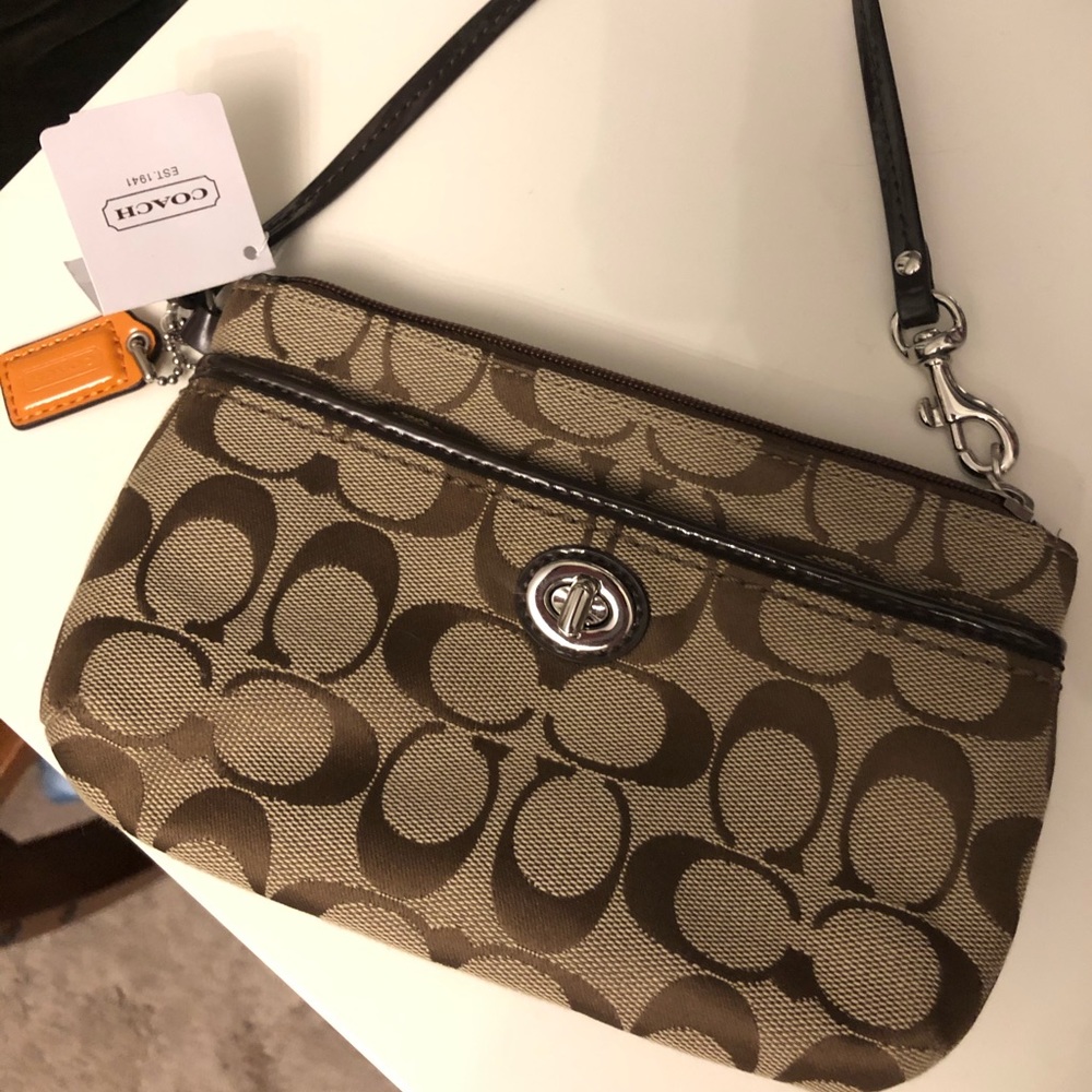 Coach wristlet with logo new with tags!